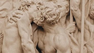 Classical marble sculpture of entwined figures